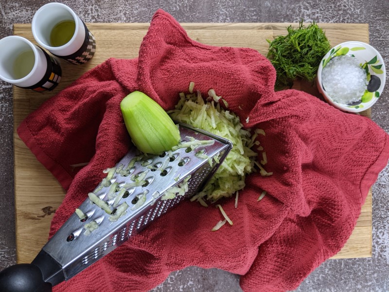 Grated cucumber for tzatziki sauce.