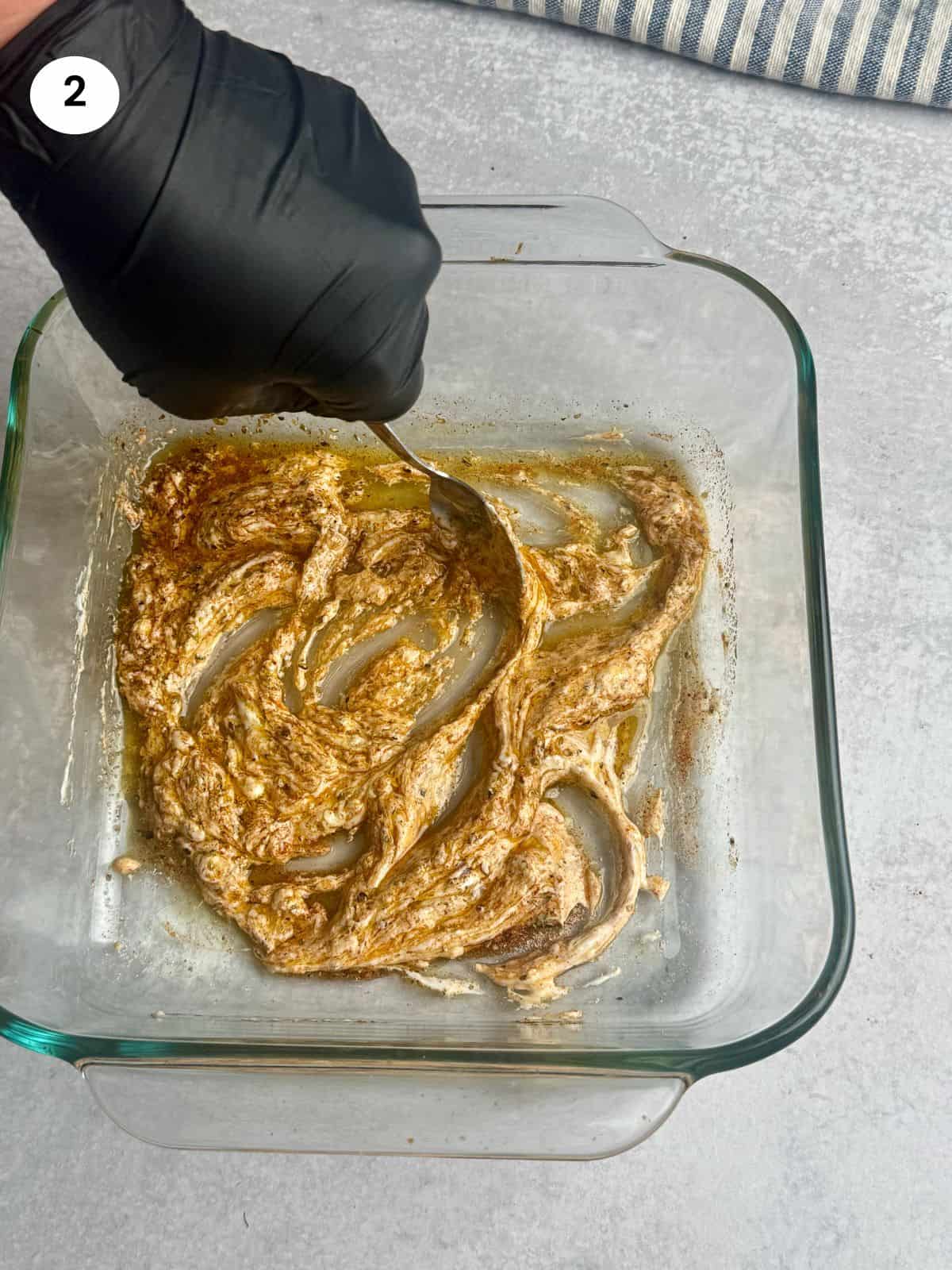 Added the oil and yogurt to the bowl.