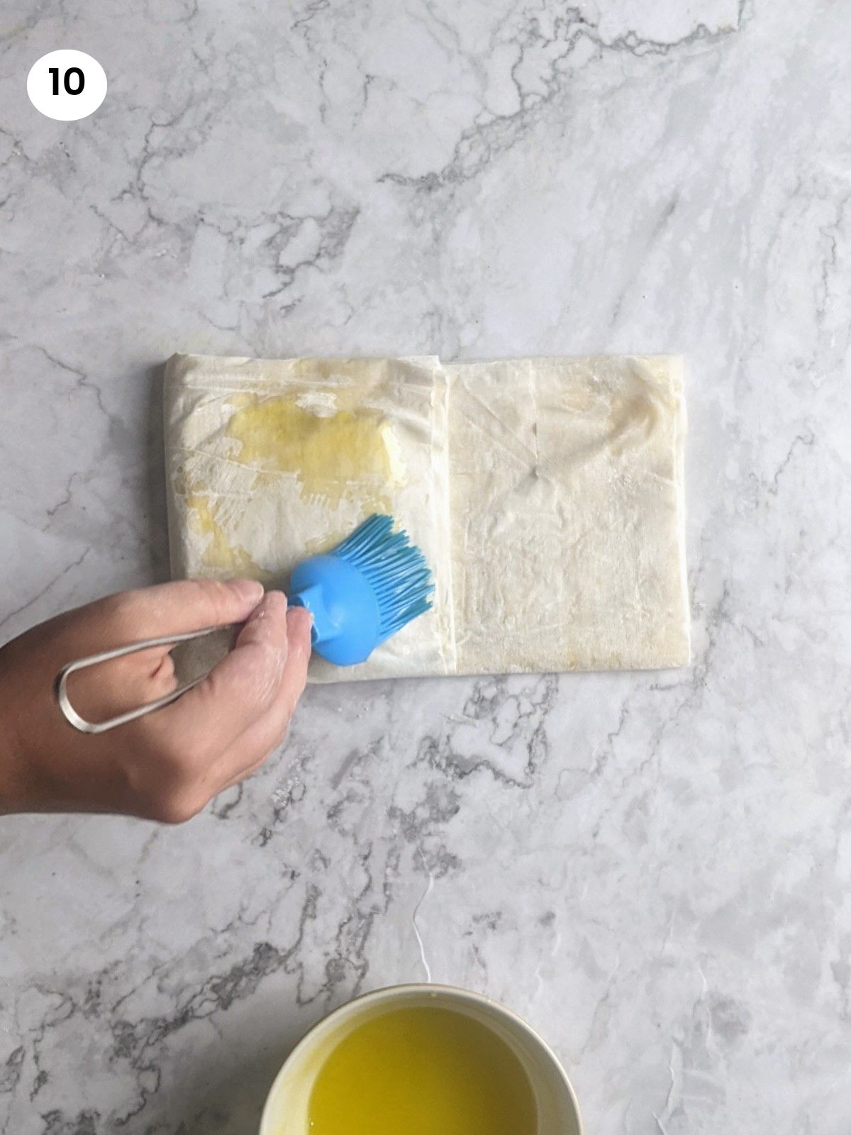 Brushing with oil only the phyllo on top of the feta.