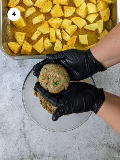 Shaping the meatballs.