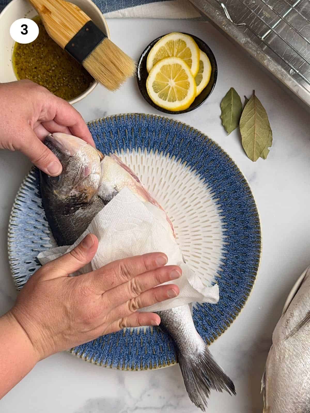Pat dry the fish before adding the marinade.
