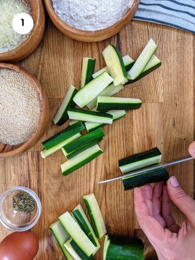 Cutting the zucchinis into wedges.