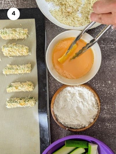 Step2: Dipping the zucchini in the egg.