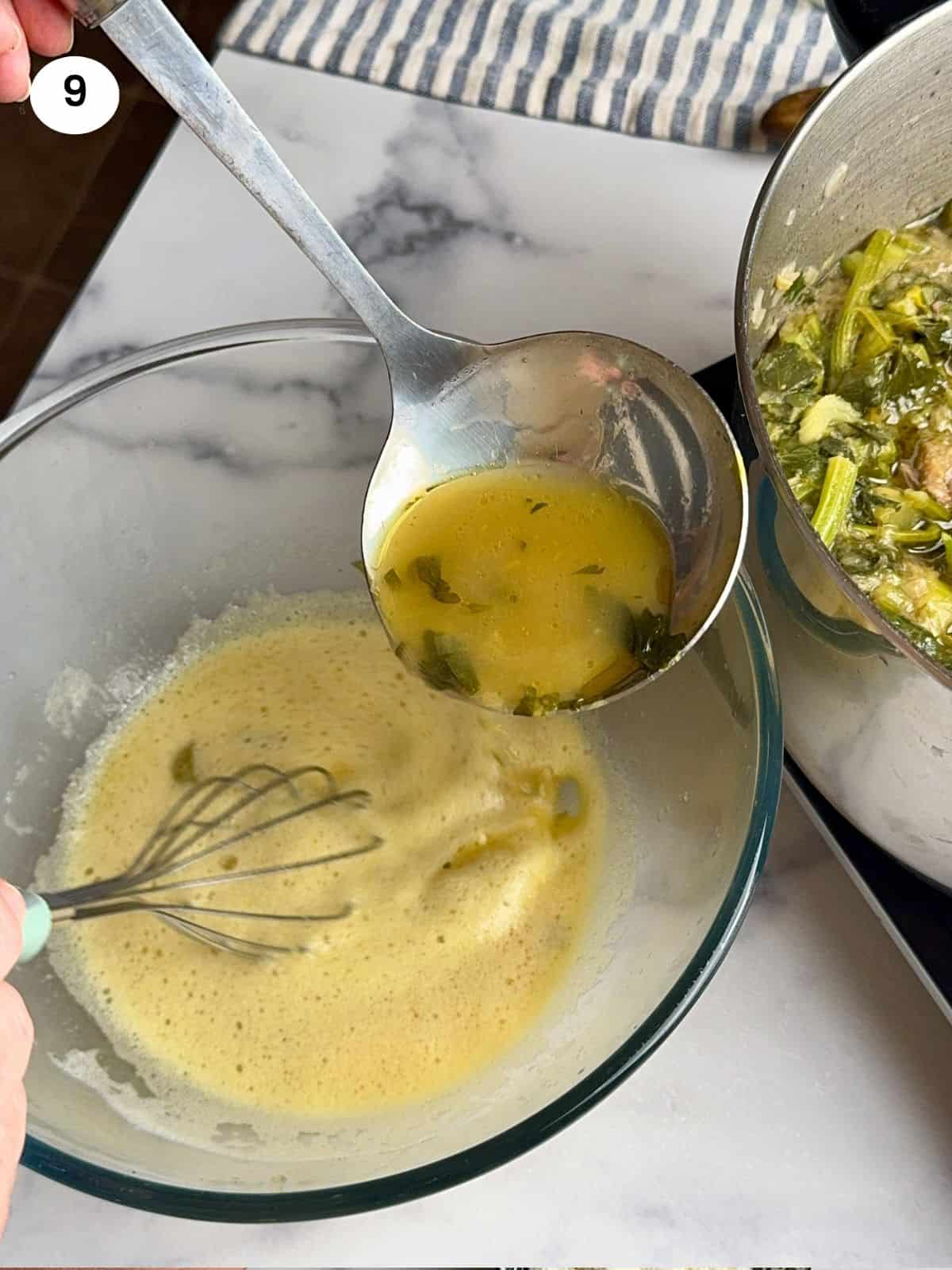 Adding a ladle of the stew juice to the egg mixture.