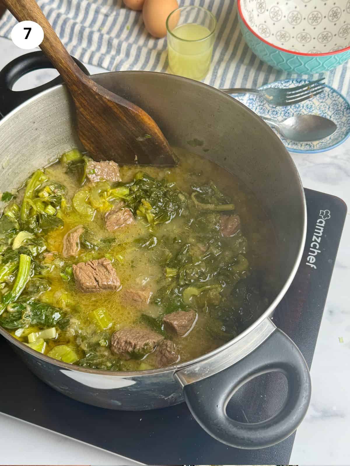 Beef and celery greens cooked.