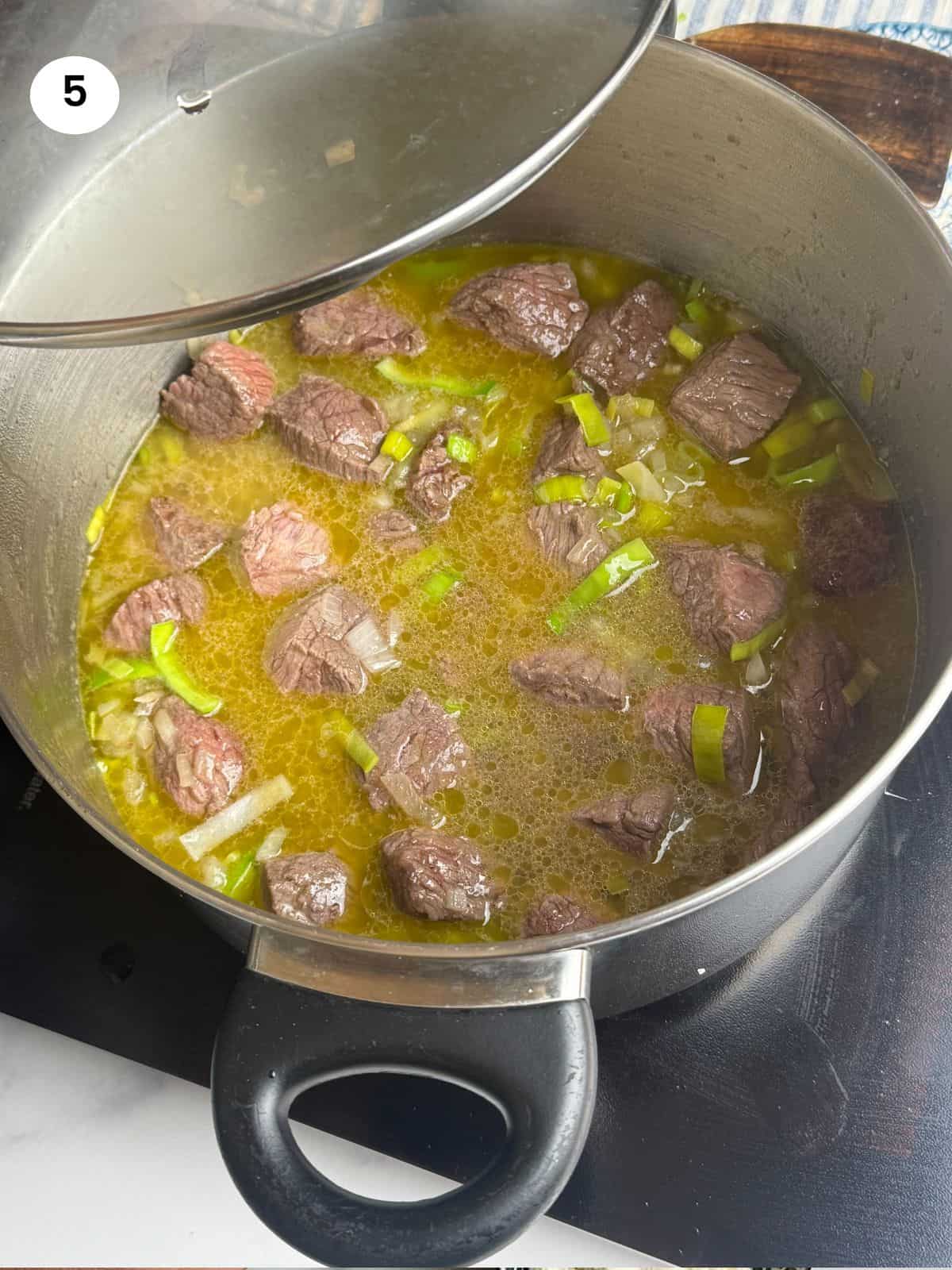 Cooking the beef in low heat.