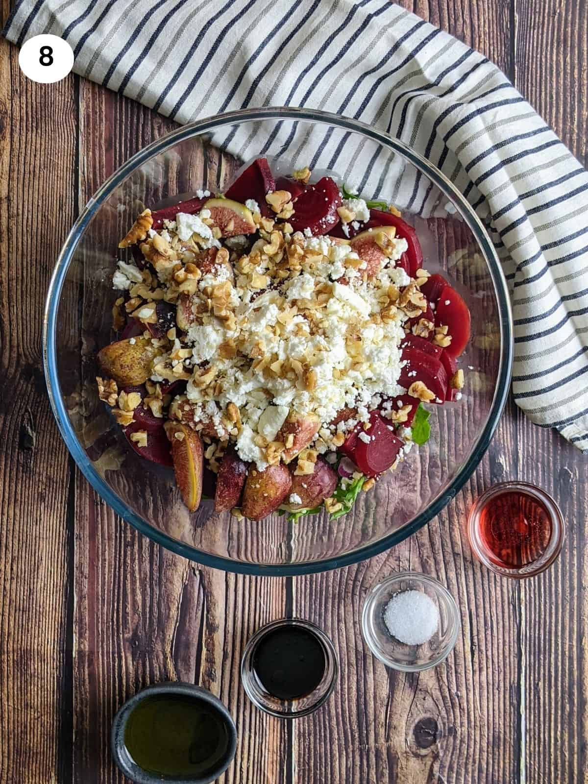 Adding the beets, feta cheese and figs on top.