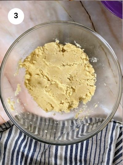 Binding dough together with water.