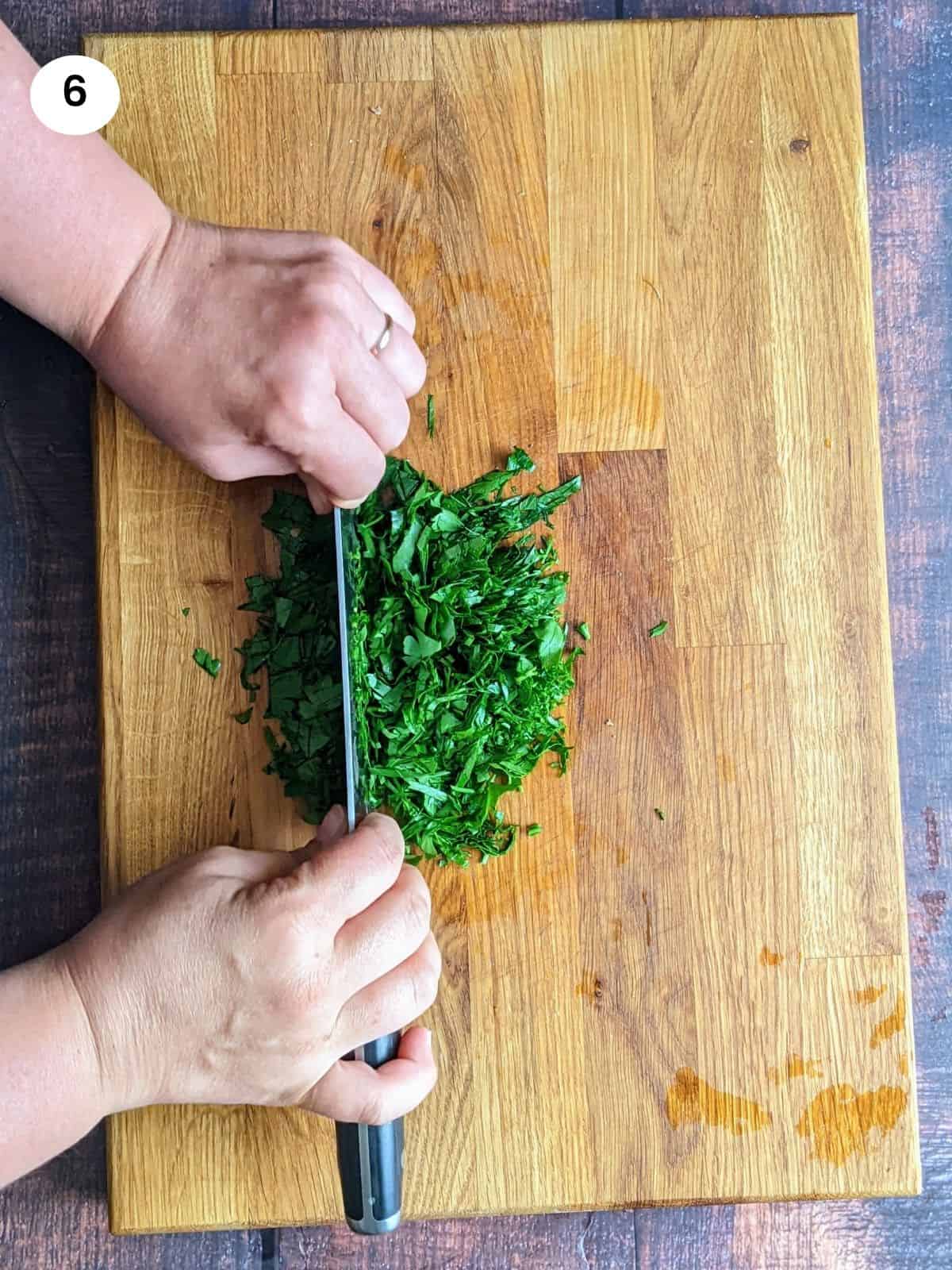 Cutting the parsley coarsely.