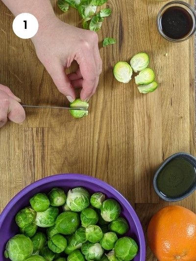 Cutting the brussels sprouts into half