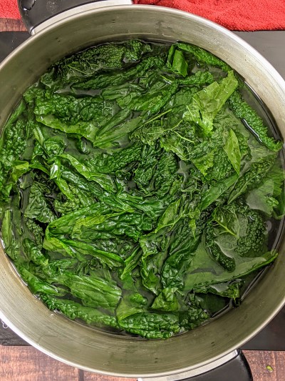 Cavolo nero leaves in boiling water.