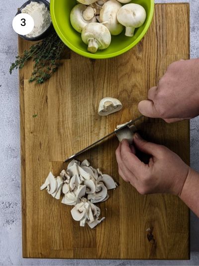 Cutting the mushrooms into slices.