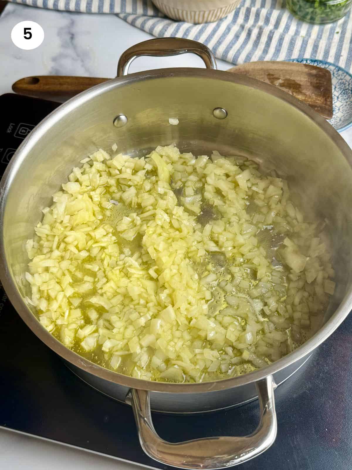 Sauteing the onion.