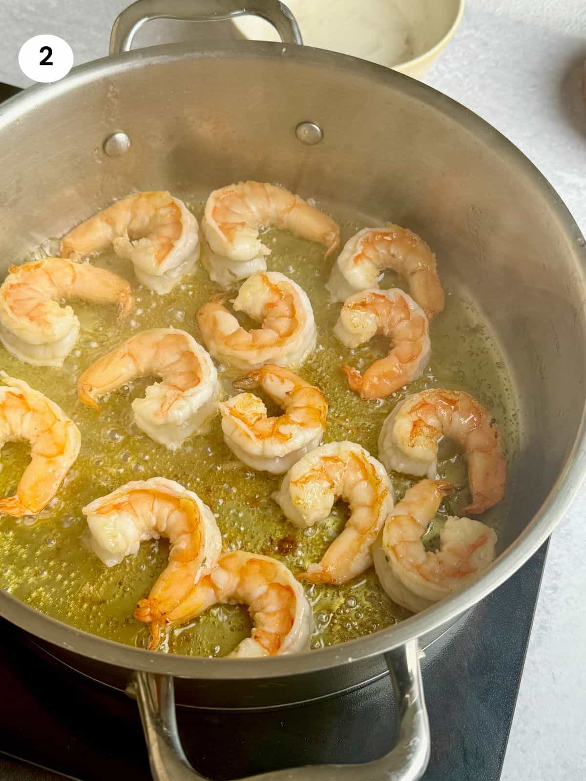 Sauteing the shrimps.