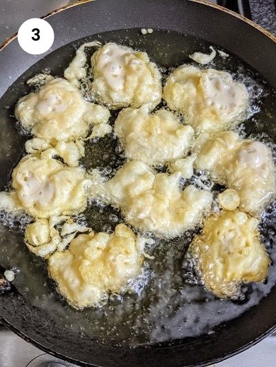 Cod bites in frying pan - uncooked.