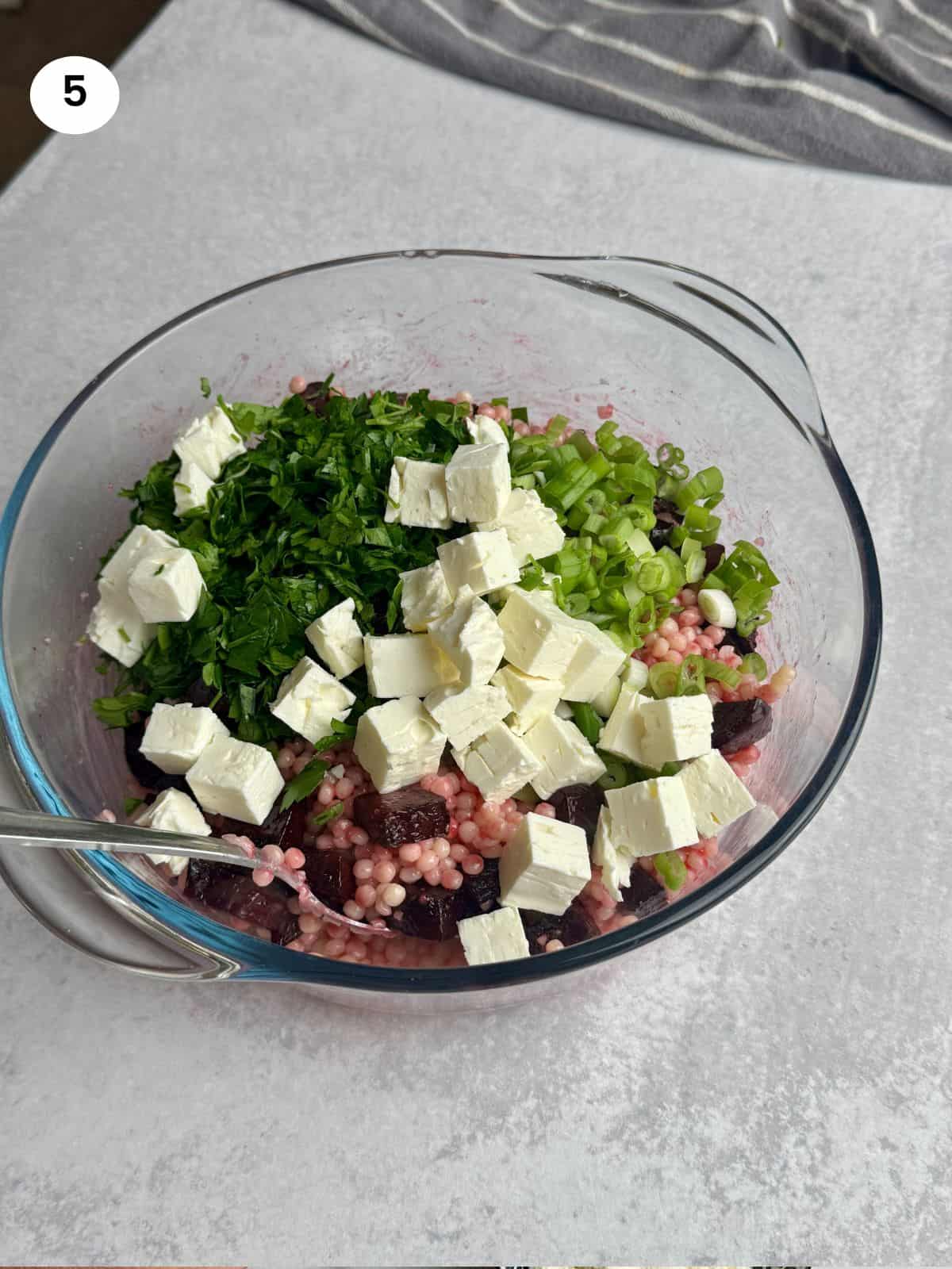 Added the feta cubes, parsley and green onions.