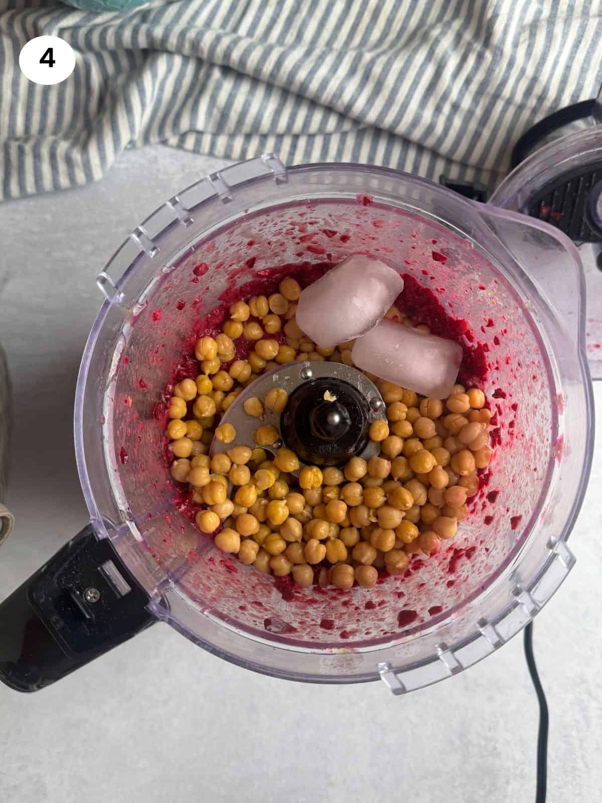 Added the chickpeas and ice to the food processor.