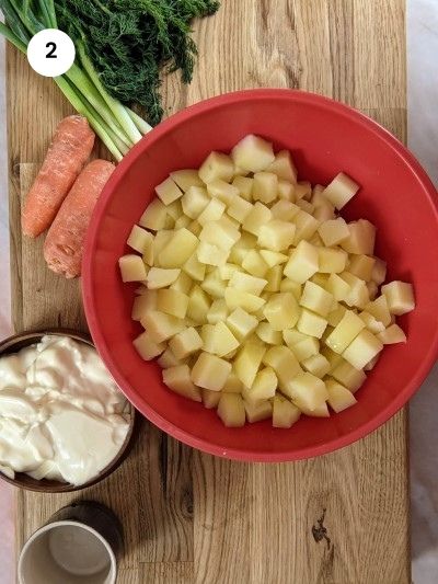 Leave the potatoes in vinegar to soak.