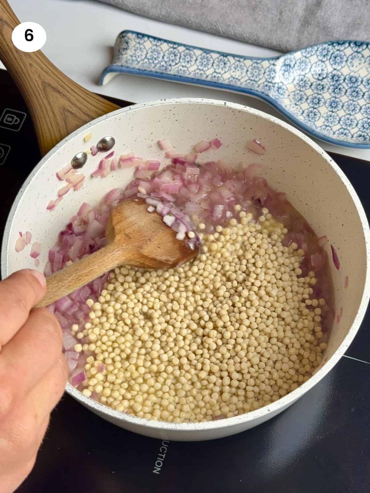 Cooking the couscous.