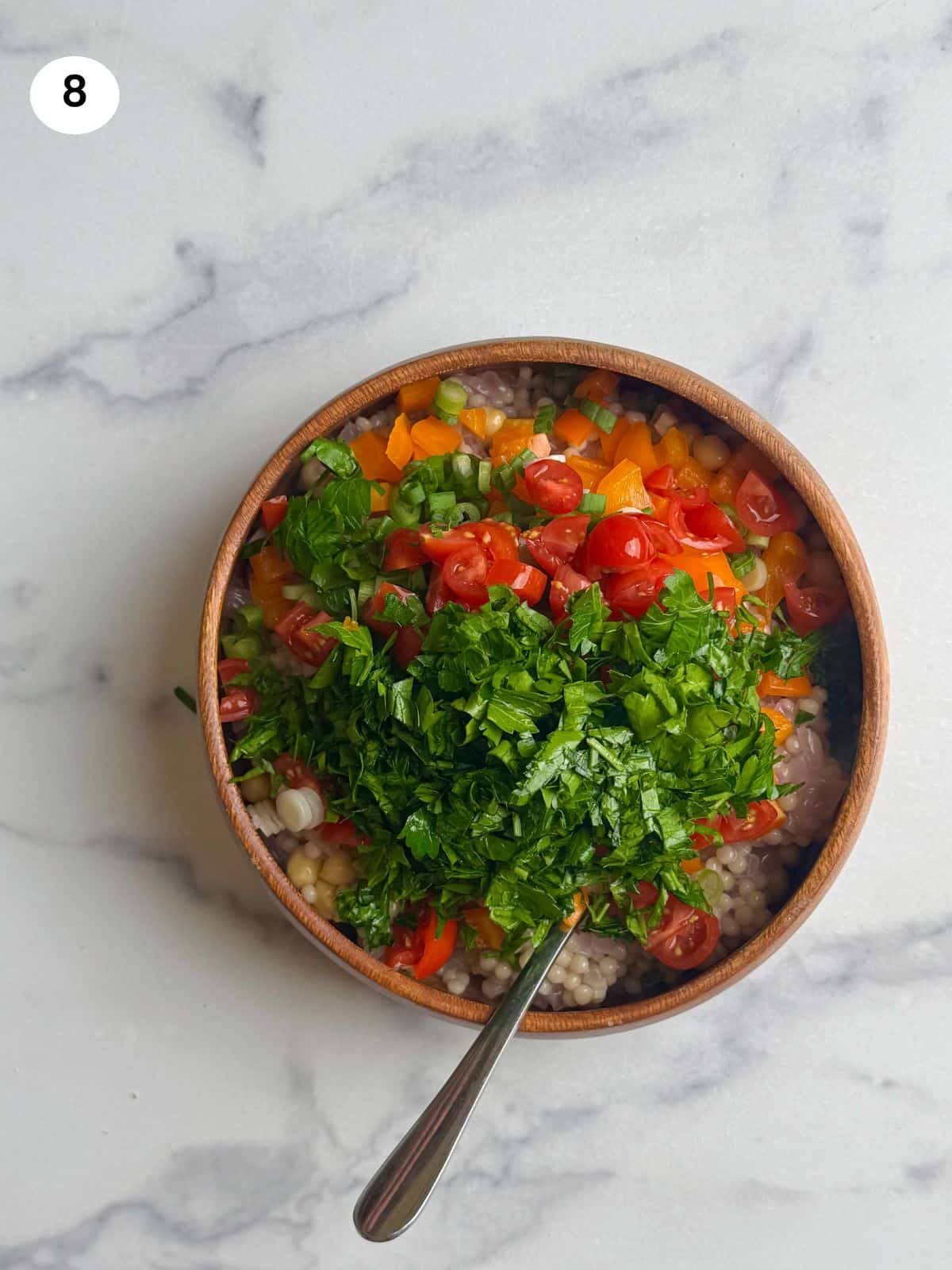 Adding the remaining chopped vegetables.