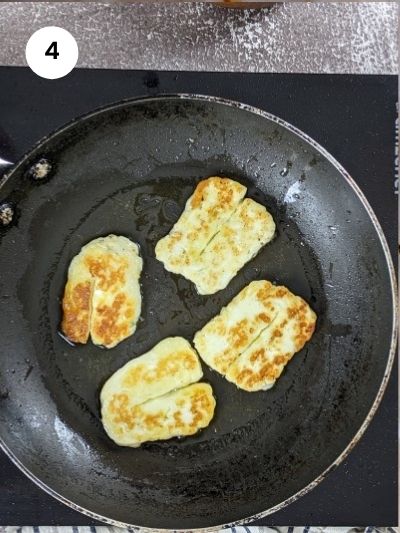 Cooked halloumi in the pan.