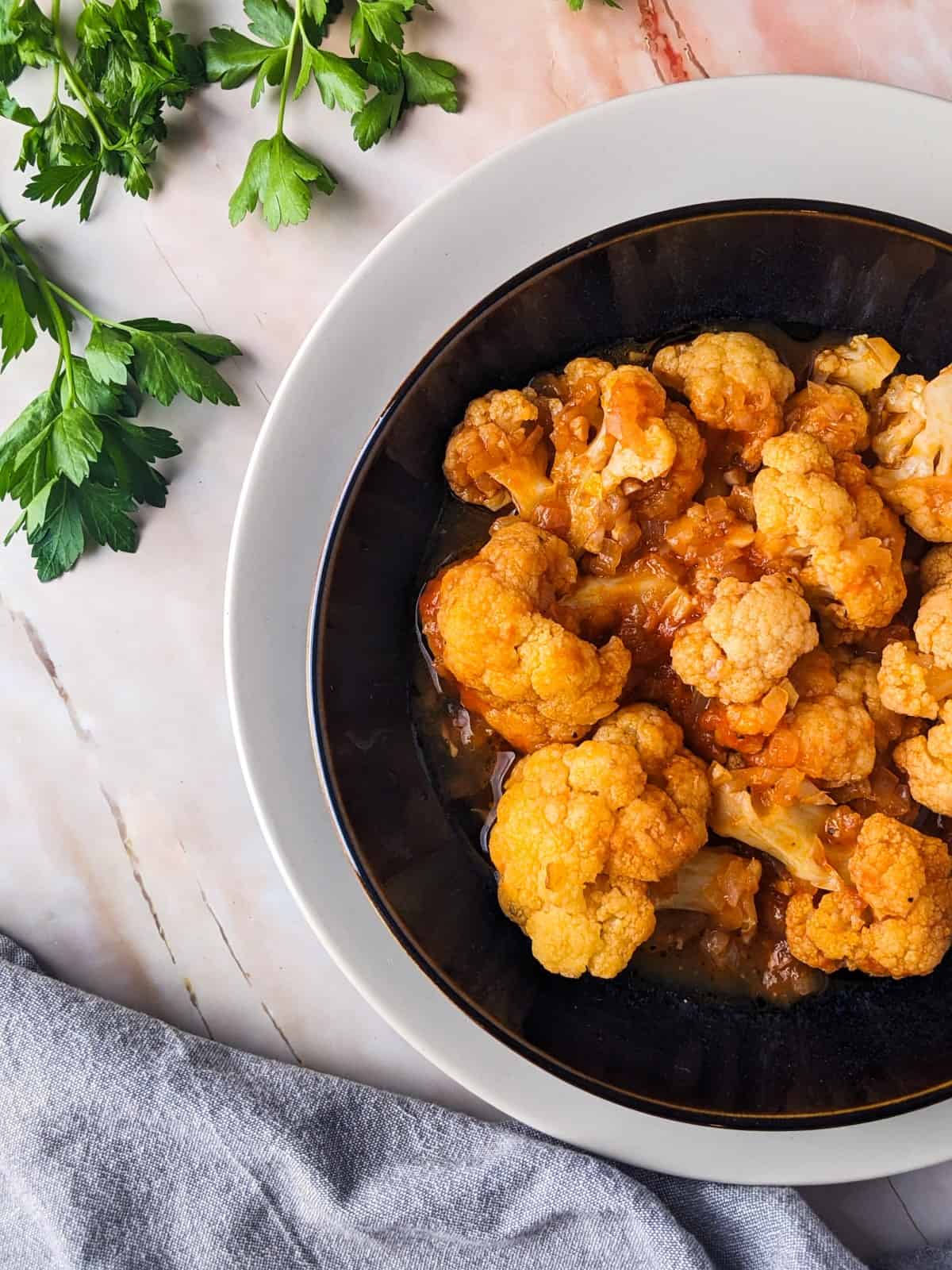 Greek Braised Cauliflower In Tomato Sauce.