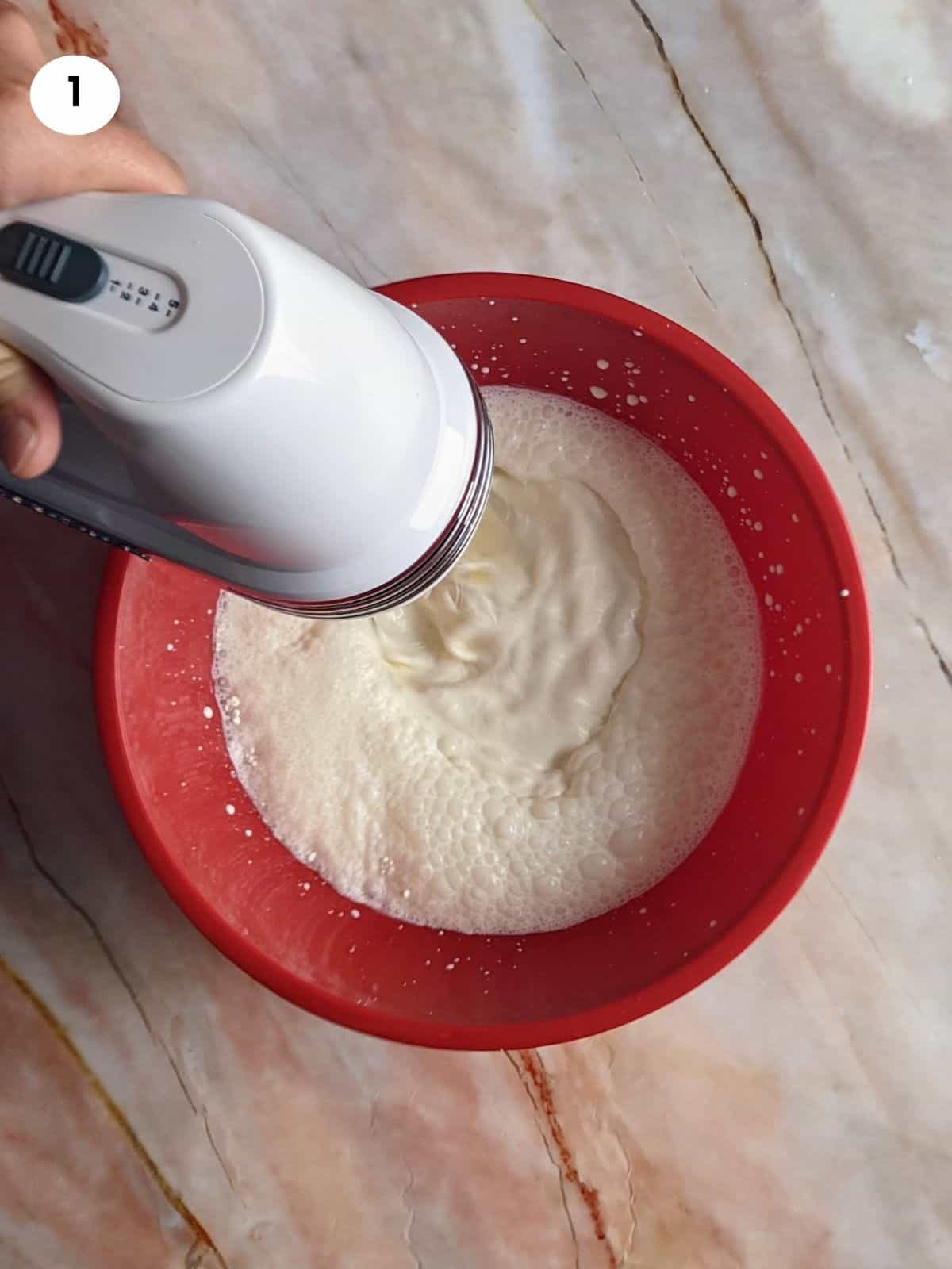 Start mixing the ingredients to make whipped cream.