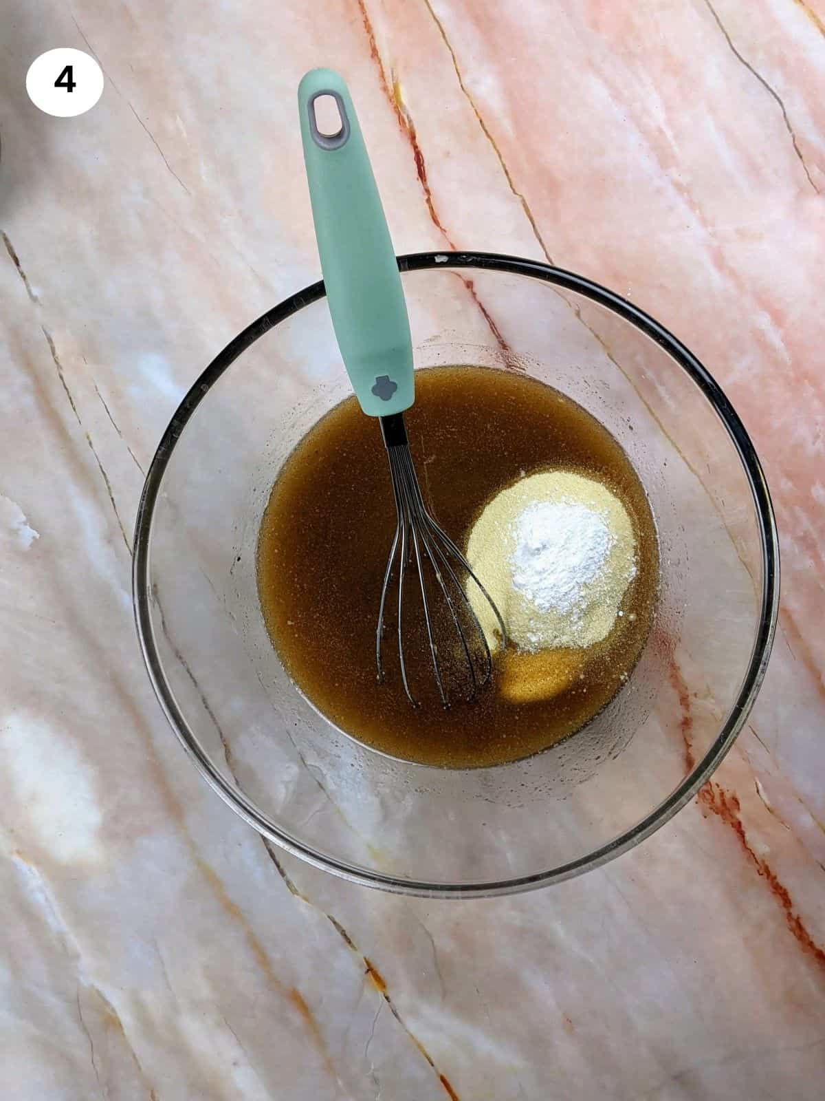 Adding semolina flour and baking powder.