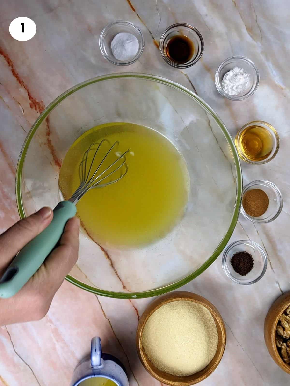Mixing the olive oil and sugar