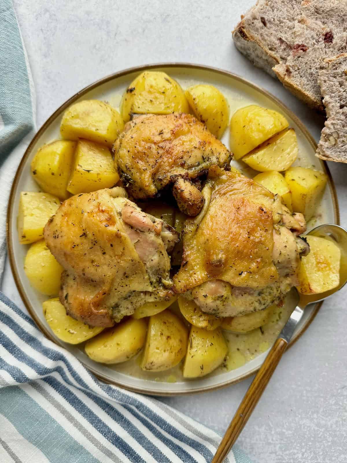 Greek Lemon Chicken Thighs And Potatoes.