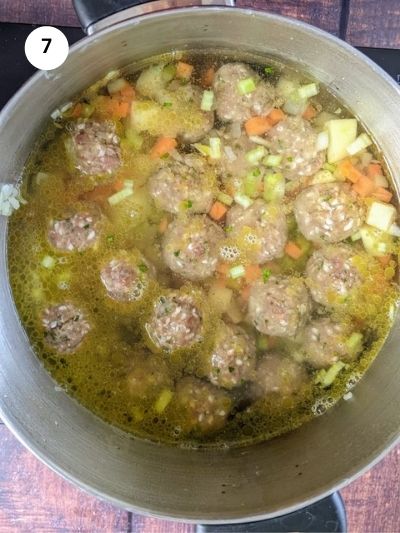 Meatballs covered with water ready to cook