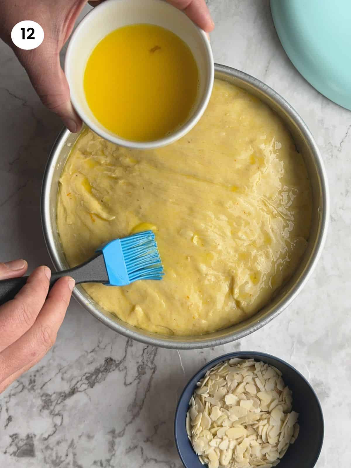 Brush the top of the vasilopita bread with eggwash.