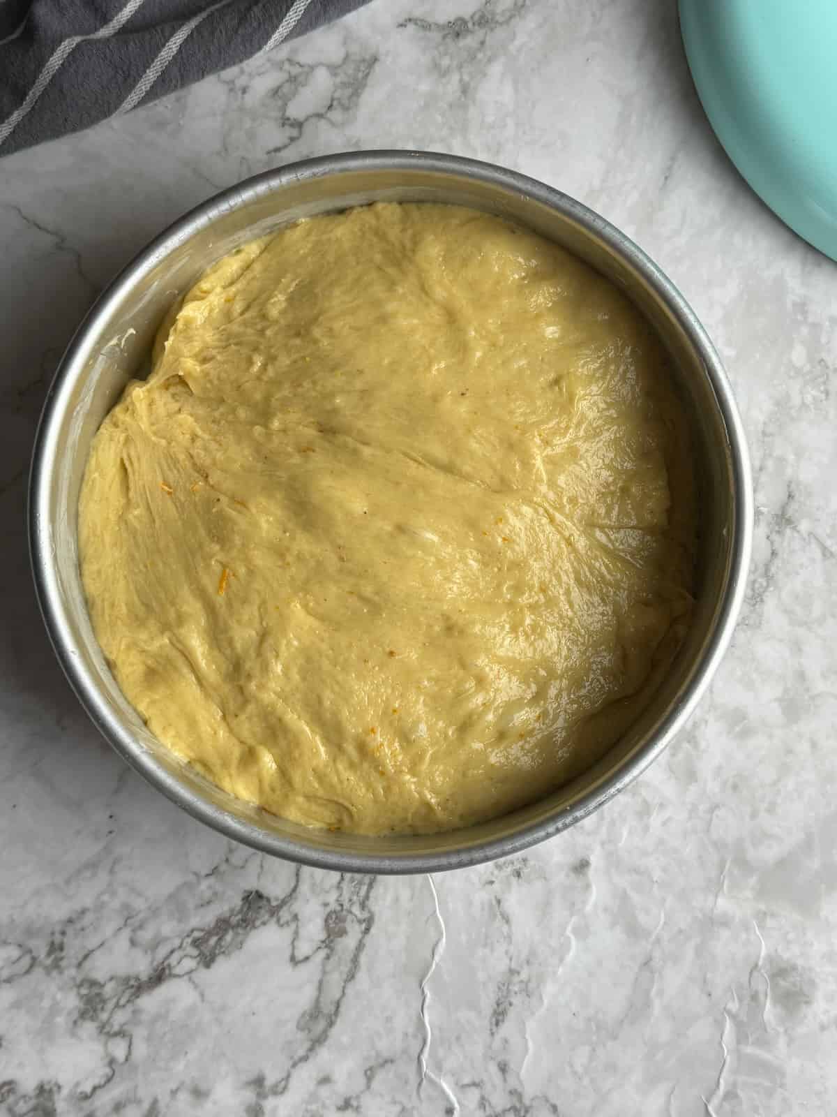 Dough in pan ready to rest again.