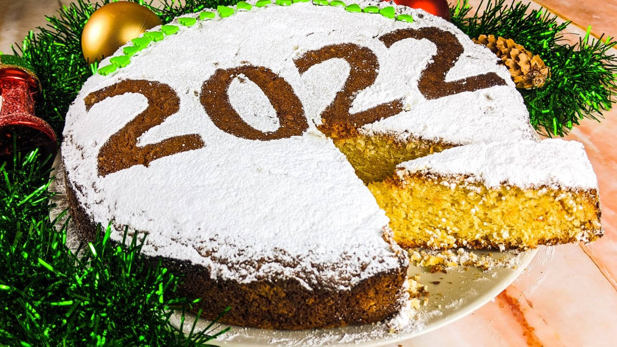 Greek new year cake decorated with powdered sugar with the current year date