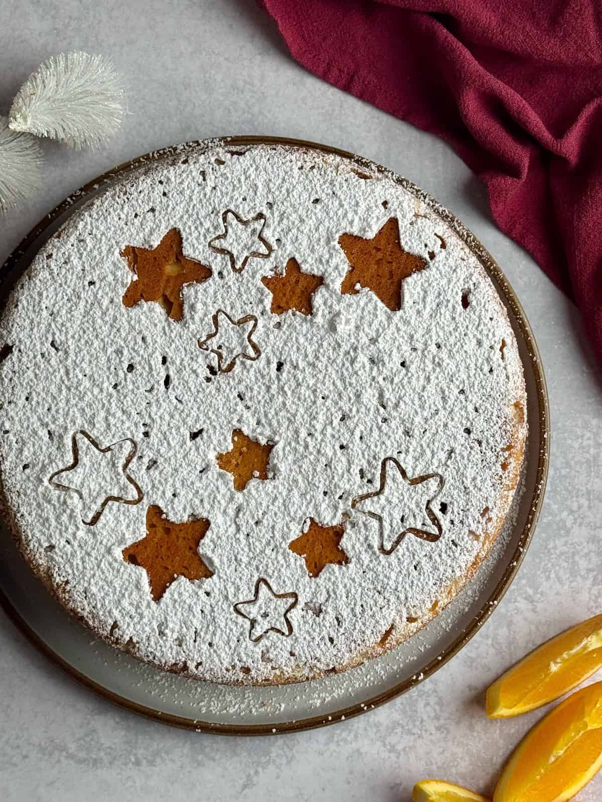 Greek new year cake decorated with powdered sugar and year date.