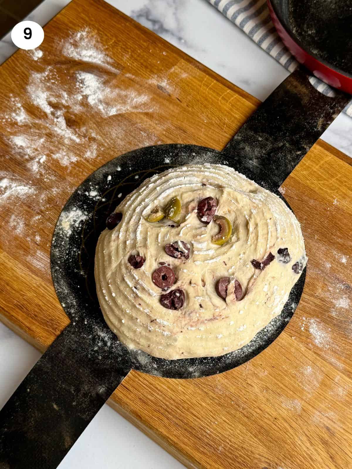 Bread loaf after rise on a silicon base.