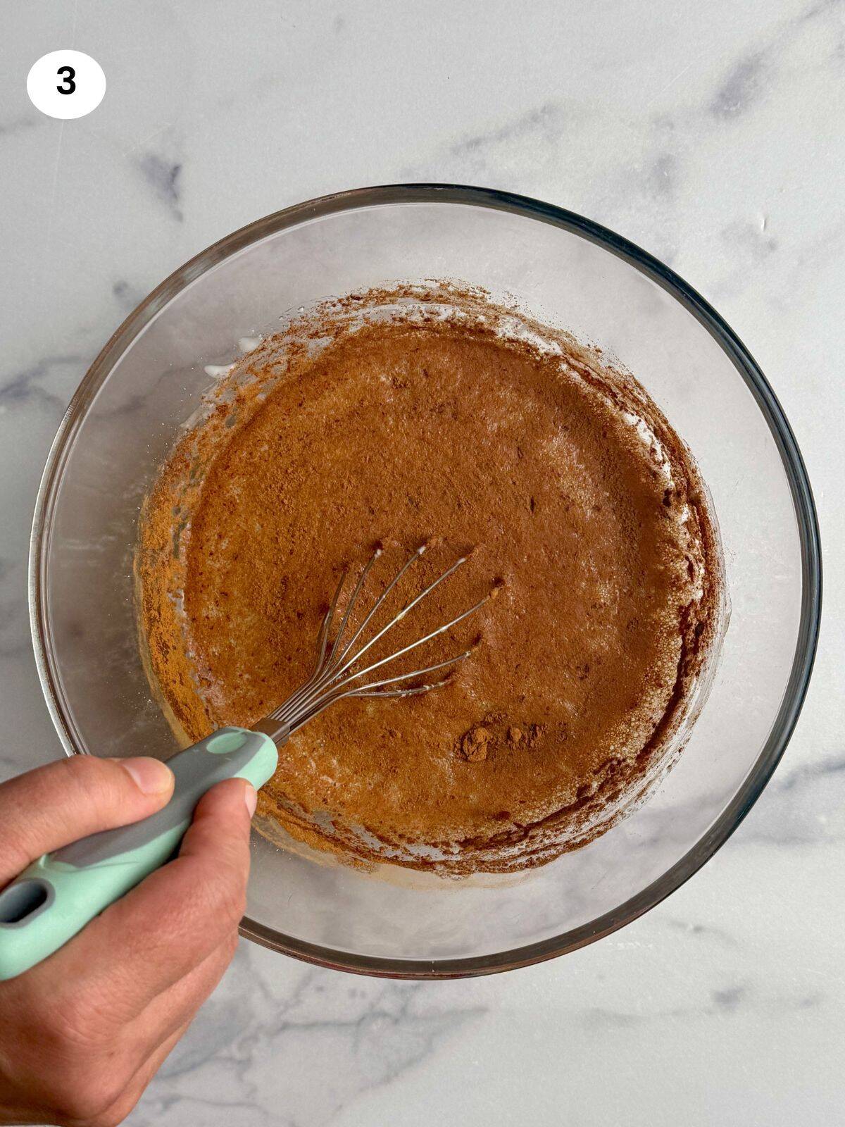 Added the ground cinnamon to the bowl.