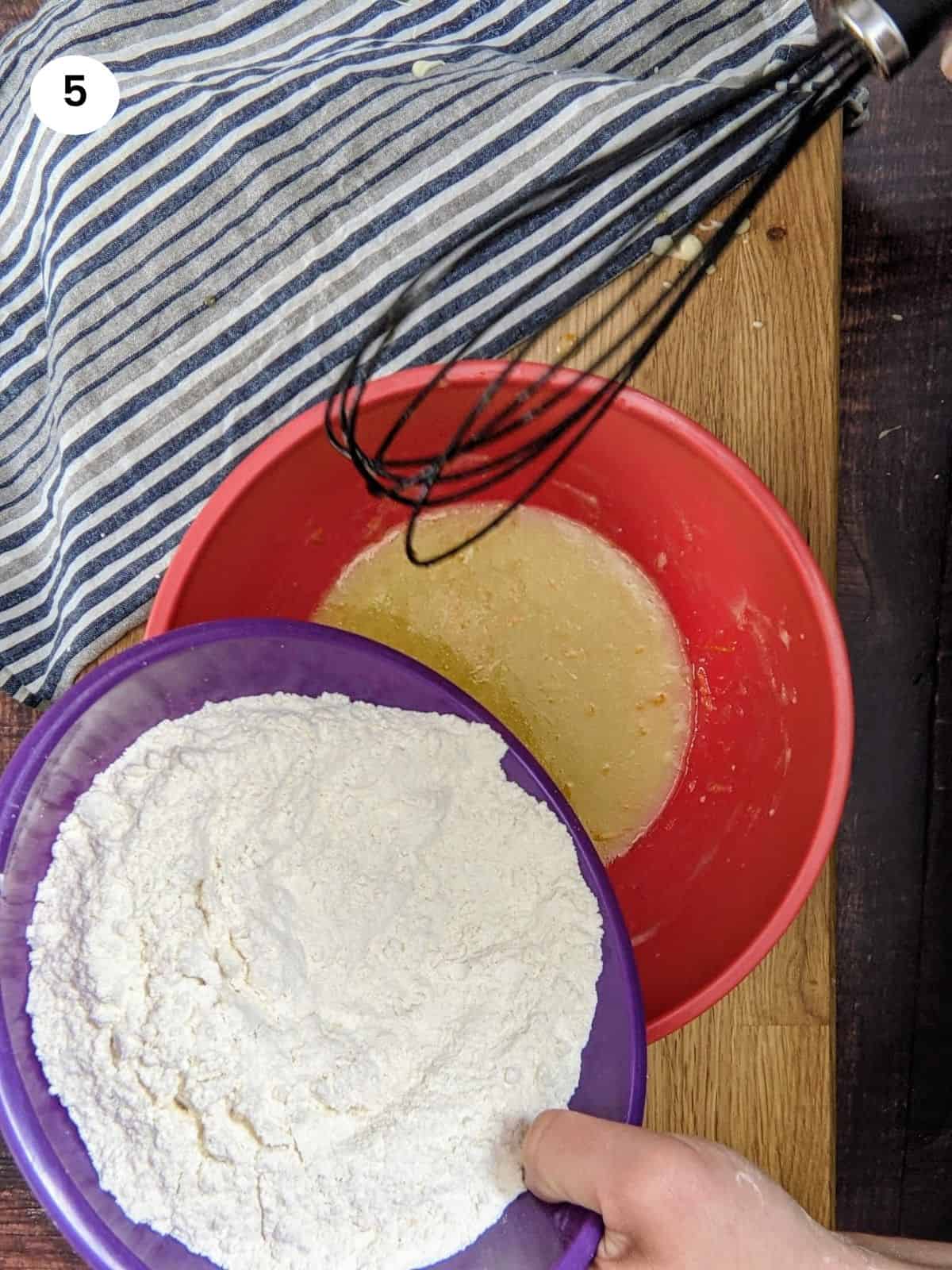 Adding flour for greek orange cookies.