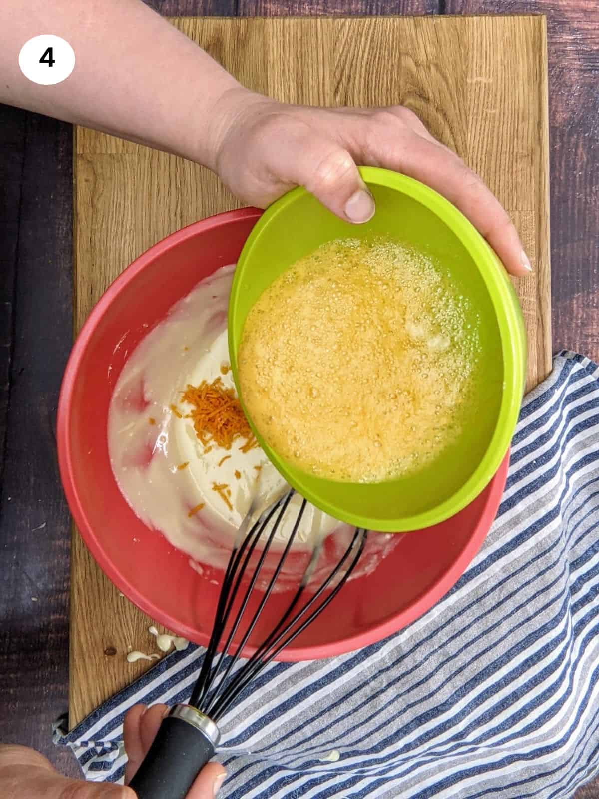 Adding the orange juice with baking soda to the sugar mixture.