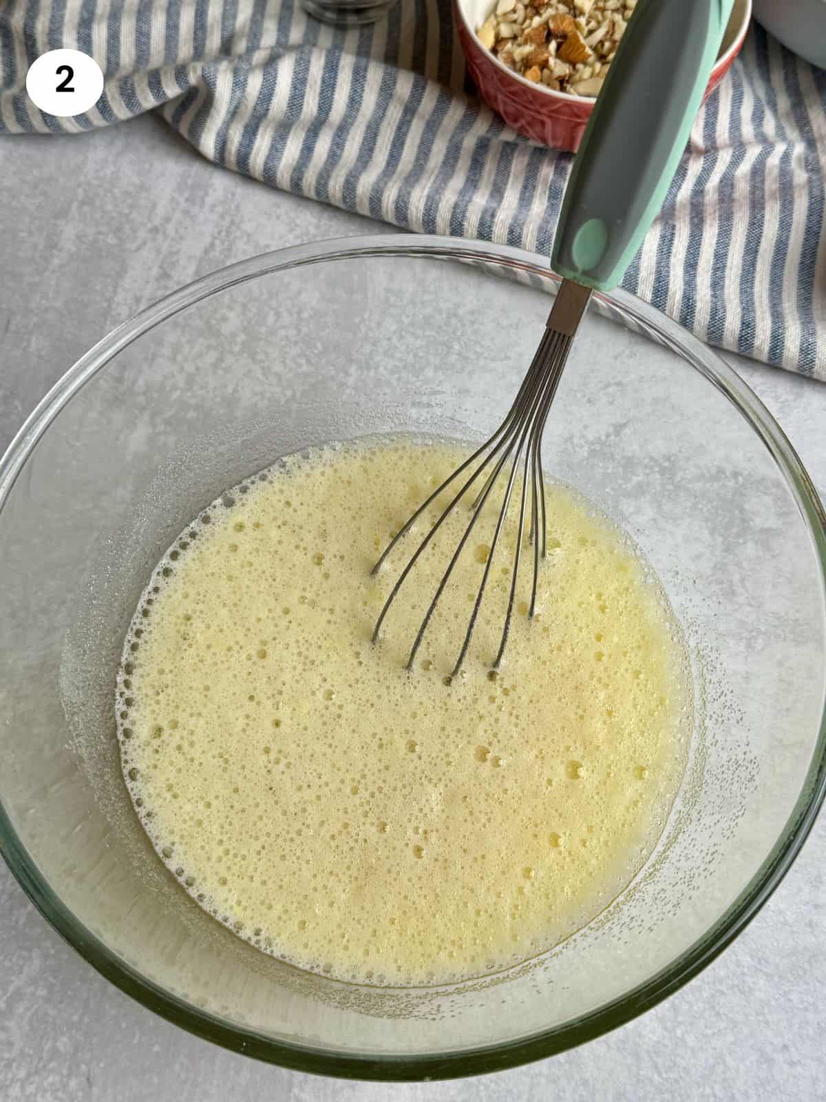 Added the orange juice and baking soda mixture to the bowl.