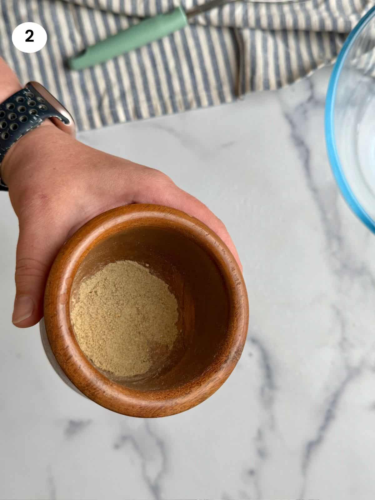 Spices grinded inside the pestle.