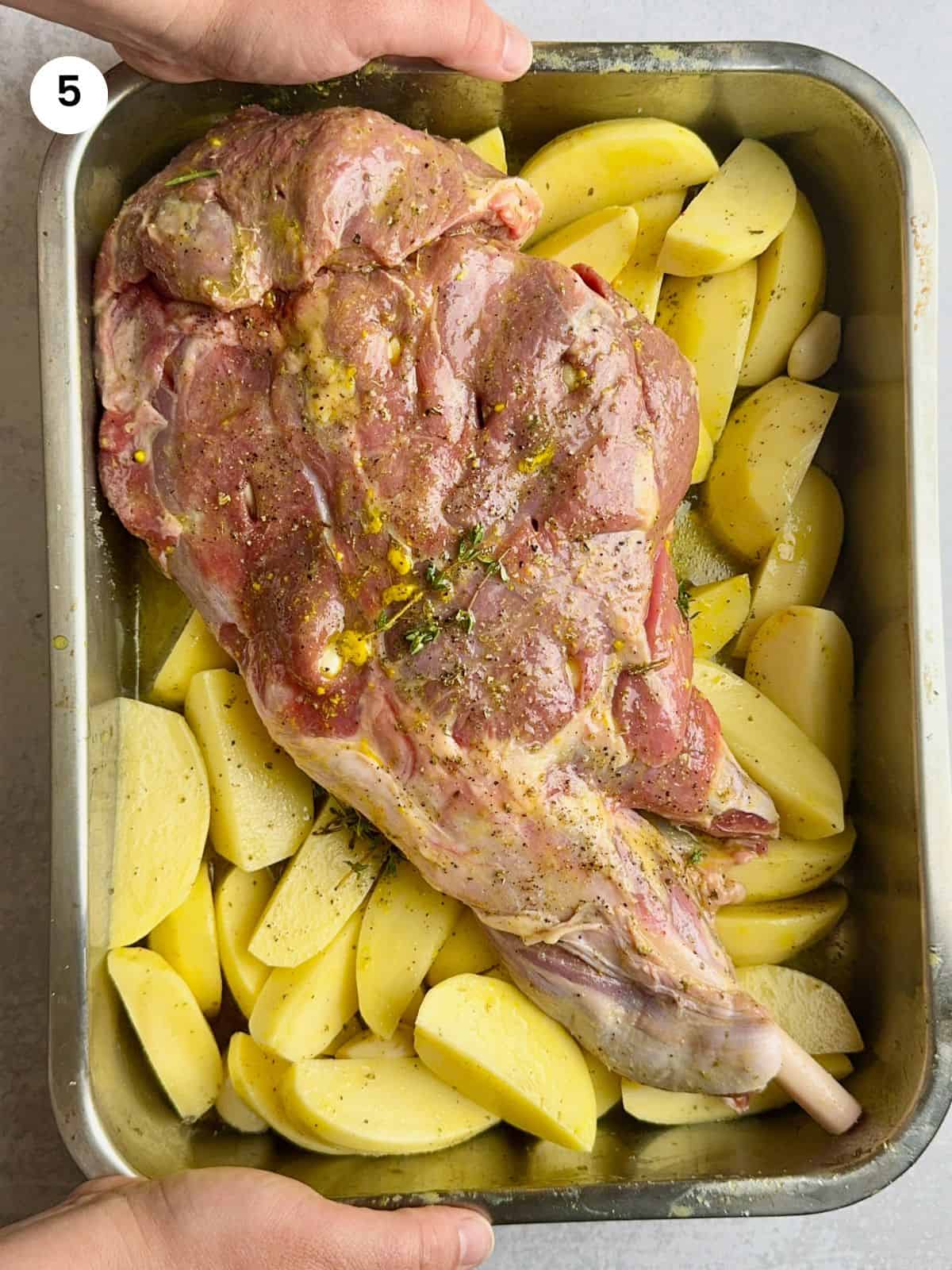 Marinated leg of lamb ready to cover and go in the oven.