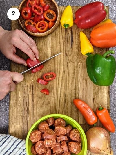 Cutting mini peppers in slices.