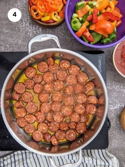 Saute sausages for greek spetzofai.