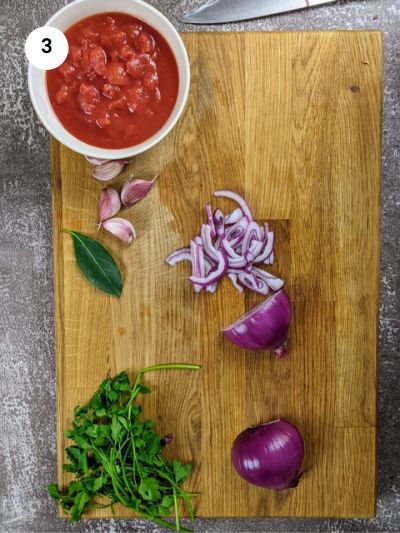 Cutting the onions into slices.