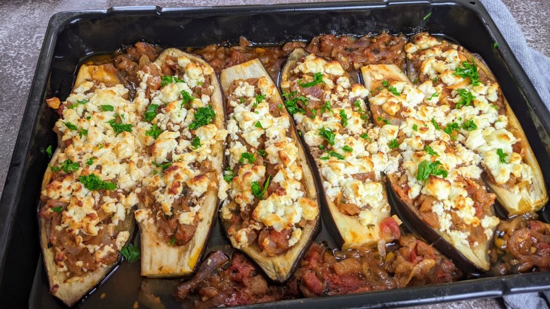 Greek stuffed eggplants in a tray when they come out of the oven