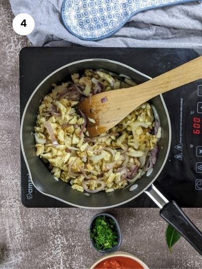 Sauteing the onions, garlic and eggplant flesh.