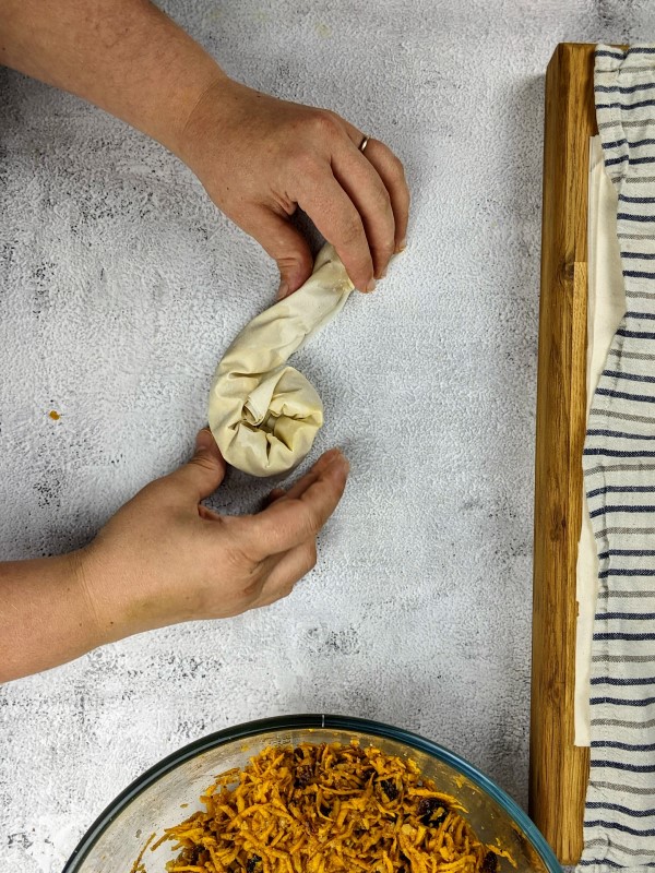 Making a coil shape with the phyllo roll.