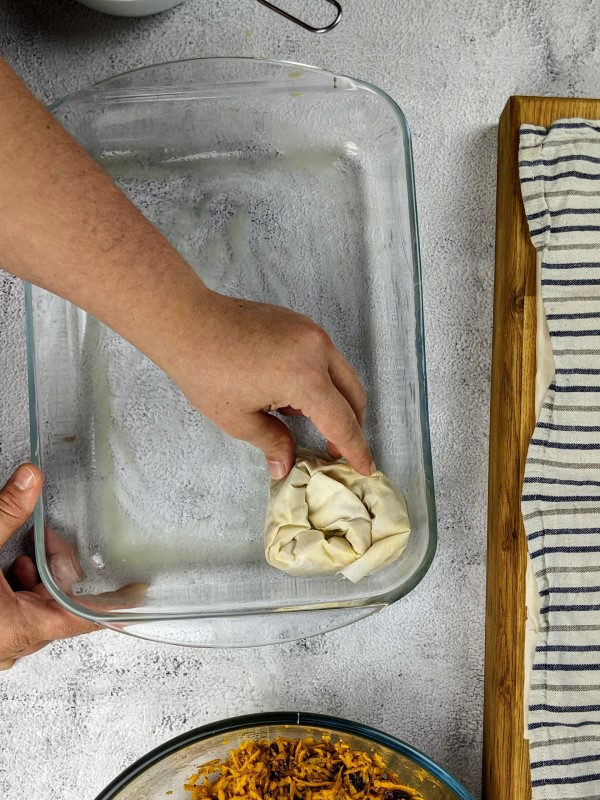 Placing the pumpkin pie swirl into a tray.