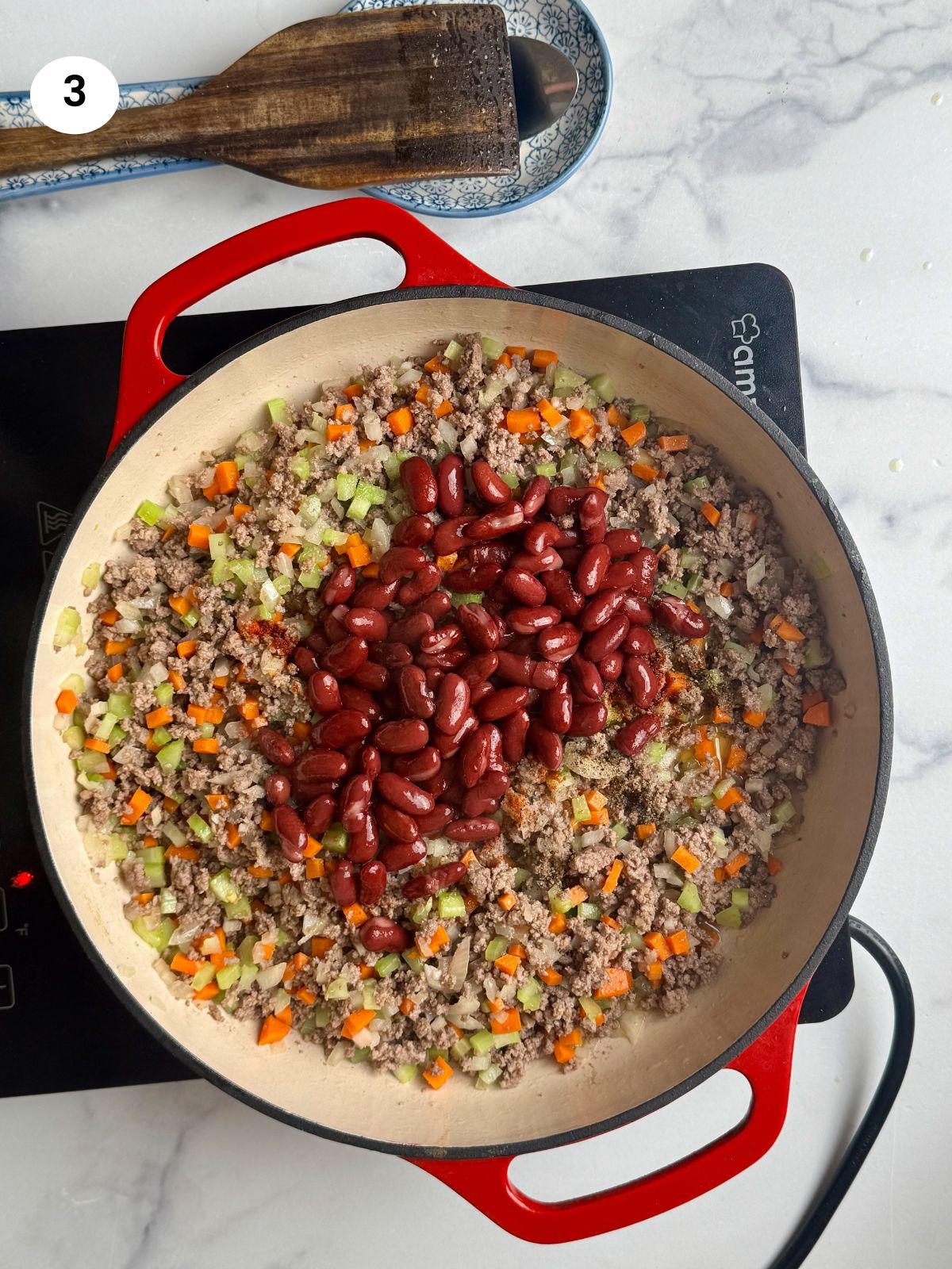 Added the beans to the pan.